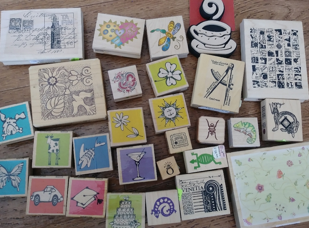 Qty 28 stamps and 5 ink pads